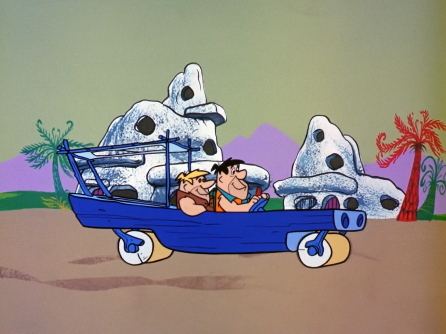 fred flintstone in his car