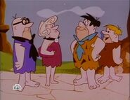 Mrs. Slate along with her husband, Mr. Slate, Fred and Barney in the episode, "Dummy Up" from The Flintstone Comedy Show.