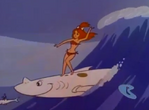 Pebbles and her sharkasaurus surfboard from The Flintstone Comedy Hour.