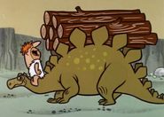 A stegosaurus dump truck from "The Swimming Pool".