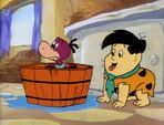 Dino in a bathtub and Freddy acting like a dog from "A Midnight Pet Peeve".