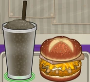 A chicken sandwich and slush