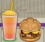 A chicken sandwich and slush
