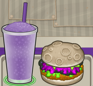 A chicken sandwich and slush