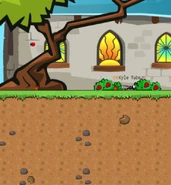 A Wasp in the middle of 2 Strawberry bushes