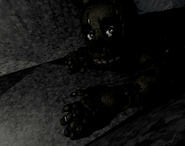 Springtrap looking up at the camera in CAM 13.