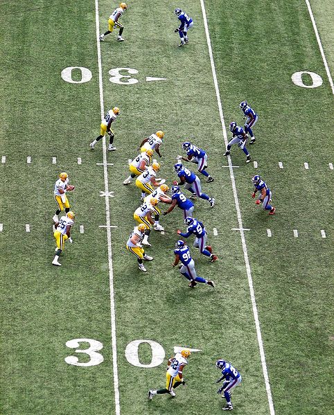 Green Bay Packers quarterback Brett Favre throws the football to the  sidelines after throwing a complete pass in the fourth quarter against the  St. Louis Rams, eclipsing Dan Marino to become the