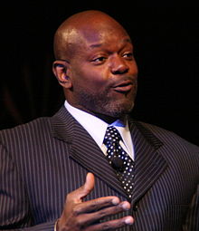 L to R) Former Dallas Cowboys coach Jimmy Johnson, running back Emmitt  Smith, and wide receivers Michael Irvin and Drew Pearson are seen after a  halftime ceremony honoring the teams Hall of