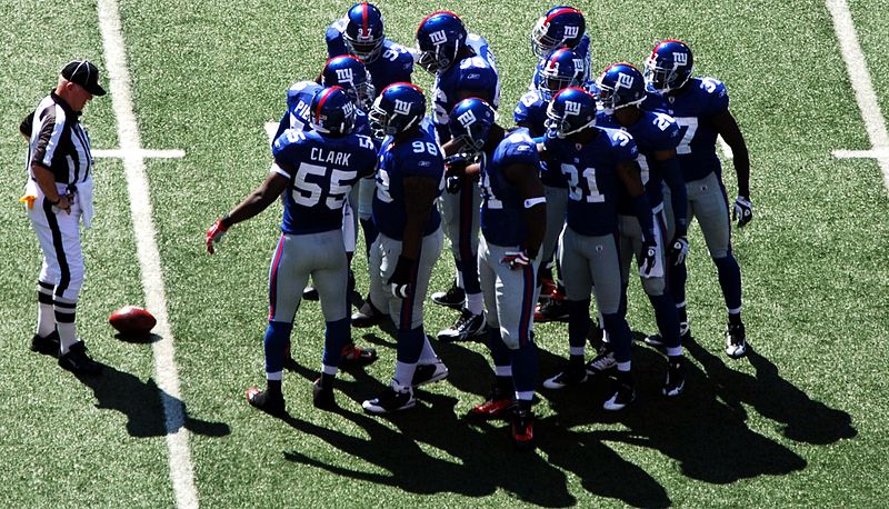 New York Giants defensive back Michael Coe, center, is shown before an NFL  football game between the New York Giants and the Philadelphia Eagles  Sunday, Nov. 20, 2011 in East Rutherford, N.J. (