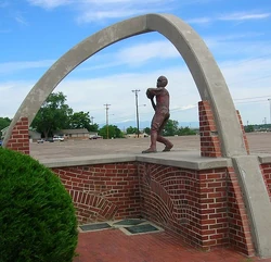 Entrance to Dutch Clark Stadium in Pueblo, Colorado, with  in the distant background.