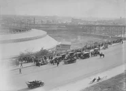 Exterior of the Polo Grounds with Harlem River Speedway in foreground, circa 1915. Note vacant lot, site of Manhattan Field.