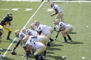 Clausen takes a snap against .