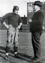 Pitt center  with Hall of Fame football coach 