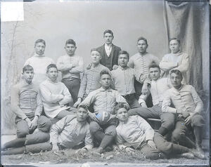 Portrait of College Football Team, The "Pirates," in Partial Uniform, and with Man in Business Suit 1879