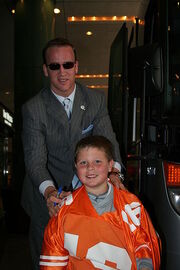 Peyton Manning in suit