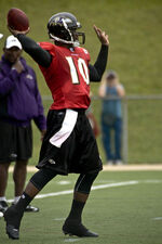 Former Buckeyes QB  (shown as a member of the NFL's ), the 2006  winner