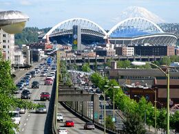 A stadium surrounded by historic buildings