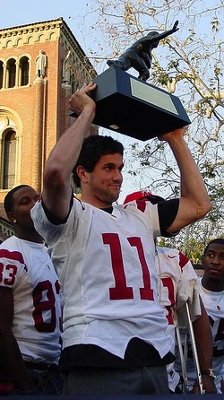 Matt Leinart hoists his Heisman Trophy at a 2005 campus rally