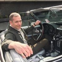 Chris Agos in a Corvette