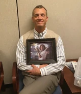 BTS S3 Joel Kinnaman with Molly's photo.jpg (117 KB)