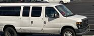 The 2014 Ford E-350 XL Extended Passenger Van Exterior Shown in Oxford White with Swing Out Passenger Side Cargo Doors, Rear Swing Out Cargo Doors and 16" Steel Wheels with Full Sport Wheel Covers