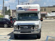 The 2014-2015 Ford E-350 Cutaway Van Exterior shown in Oxford White equipped with the High-Series Exterior Upgrade package with a Passenger Side Door Deleted and 16" x 7" White-Painted Steel Wheels used on Coach and Equipment Phoenix ML Wheelchair-equipped Shuttle Buses