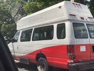 The 2012-2013 Ford E-350 Windowed Extended Cargo Van Exterior Shown in Oxford White with Swing Out Passenger Side Cargo Doors, Rear Swing Out Cargo Doors and 16" x 7" White Painted Steel Wheels