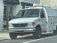 The 2007 Ford E-350 Cutaway Van Exterior shown in Oxford White equipped with the High-Series Exterior Upgrade Package with 16" x 7" White-Painted Steel Wheels