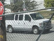 The 2009-2011 Ford E-350 XLT Extended Passenger Van Exterior Shown in Oxford White with Swing Out Passenger Side Cargo Doors, Rear Swing Out Cargo Doors and 16" Steel Wheels with Full Sport Wheel Covers