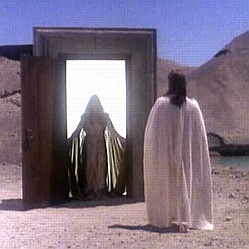 Nick confronts his Guide figure at the gateway between life and death
