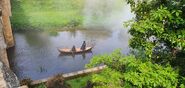 Two robed characters on a boat.