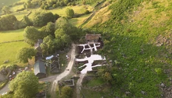 Aerial view of Galboly, showing a remodelled cottage (with the red-spotted roof).