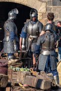 Knight extras talking (courtesy PhotoGraft).