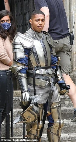 Actor in costume as a knight.