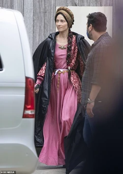 Actor in costume as a noblewoman.