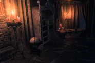 A pair of candelabra stand in the 5th floor study of the Arcane Tower.