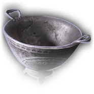 An iron bowl with added handles.