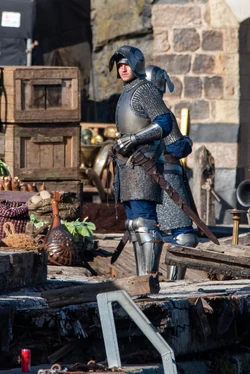 A knight extra on the dock (courtesy PhotoGraft).