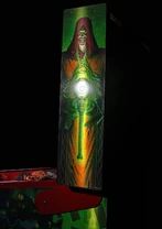 Sammaster doesn't look too pleased to be on the side of a pinball cabinet.