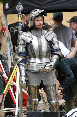 Actor in costume as a knight.