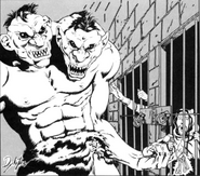 A giant two-headed troll taunts some prisoners with his keychain.
