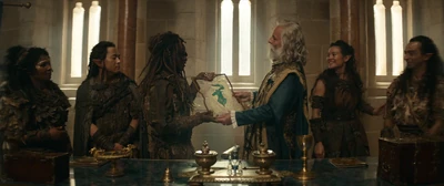 Dagult handing the signed treaty to the druids of the Enclave.