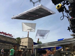 An exterior street set showing sun symbols.