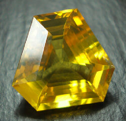 Faceted amber, trillion cut. photo by American-Thai Trading used by permission