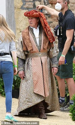 Actor in costume as a nobleman.