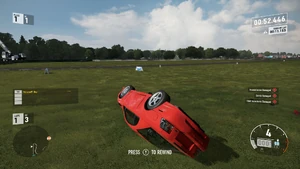 A 2000 Ford SVT Cobra R having been heavily damaged in Forza Motorsport 7.