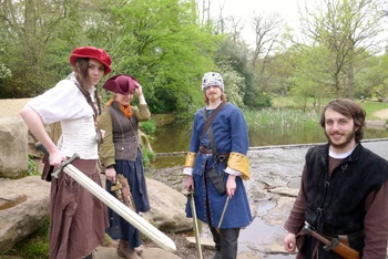 A shirt or blouse with simple trousers or a skirt is good basic kit.