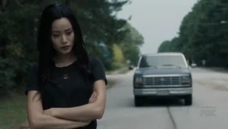 Clarice watches John track