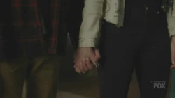 Andy and Lauren hold hands