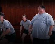 Seidleman appearing to the right of the other gym students.